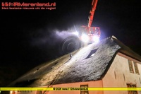 Tricht - Schoorsteenbrand in woning met rietenkap